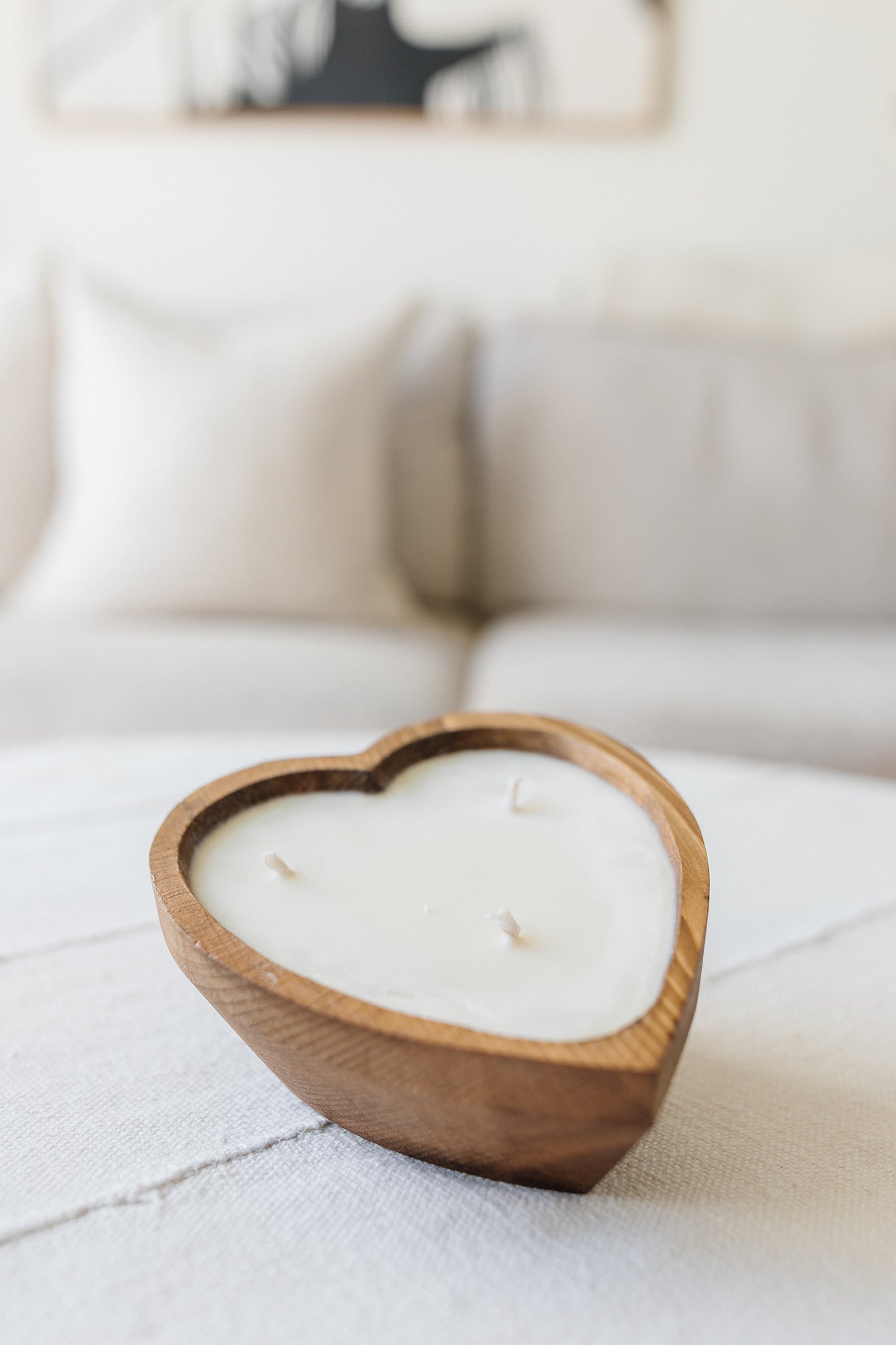 Brown wooden heart shaped candle